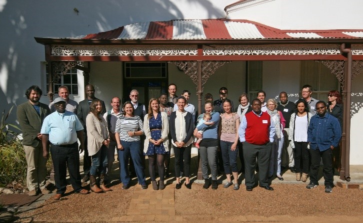 Group standing in front of building in South Africa